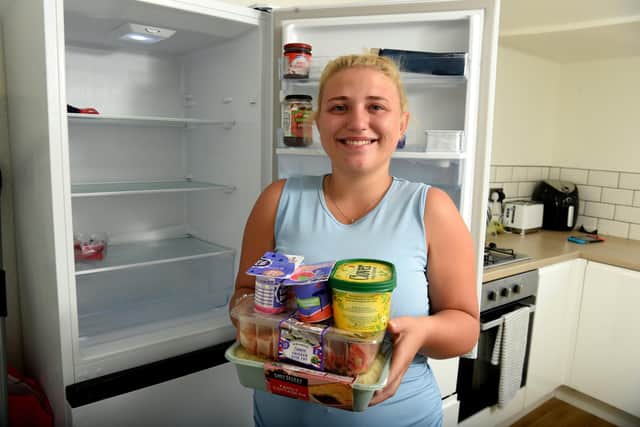 A grateful Chloe with her Lidl food shop
