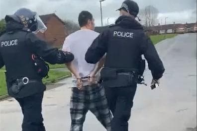 Watch as a 24-year-old man is arrested and drugs, weapons and cash are seized after drugs warrant in Preston
