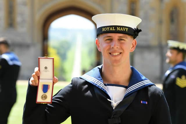 Jack Cross RVM receives his Royal Victorian Medal from King Charles III at Windsor Castle