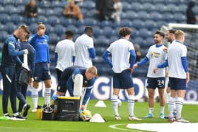 Preston North End players in the warm up ahead of facing Millwall at Deepdale