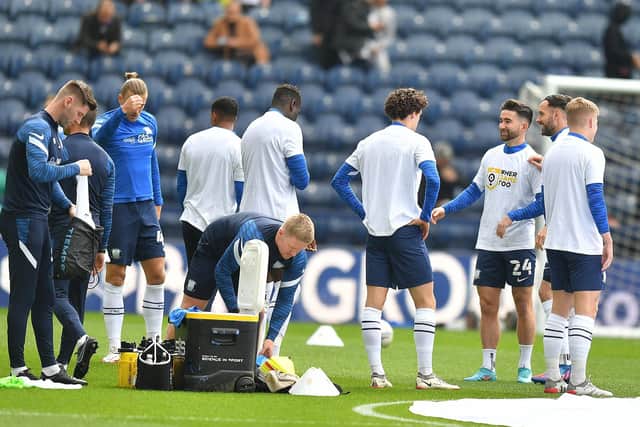 Preston North End players in the warm up ahead of facing Millwall at Deepdale