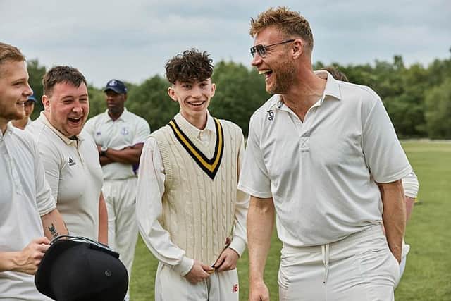Andrew Flintoff shares a joke with his new team