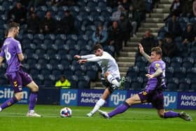 Preston North End's Tom Cannon sees his shot blocked by Coventry City's Kyle McFadzean
