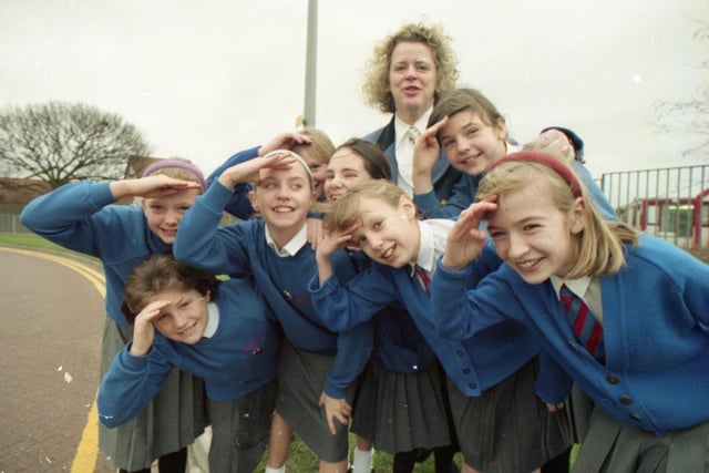 It was the absence of a lollipop lady outside Sherwood County Primary School that prompted a successful environmental scheme that involved all the pupils. It is called Safety and Health in the Local Environment of Sherwood and pupils got out of the classroom to study pollution and industry. Pictured: Ursula Walton of the North West Lancashire Health Authority with pupils at Sherwood County Primary School