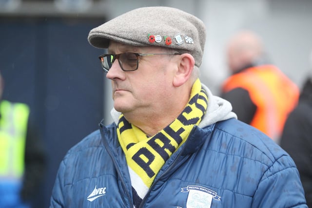 A North End supporter sports his colours at Deepdale