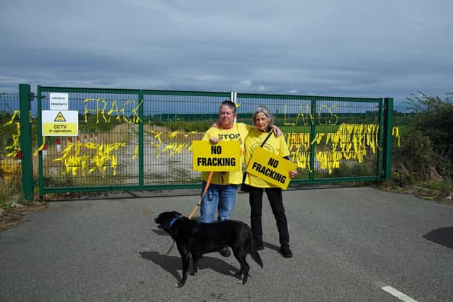 Protesters Tracey Booker (left) and Pauline Jones with dog Lizzie at the fracking site in Preston New Road, Little Plumpton, near Blackpool. 
Photo credit should read: Peter Byrne/PA Wire