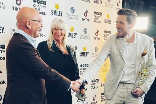 Jordan Hudson, whose film ‘Four Beats- Jordan’s Story’ won a gold award at the CFA Charity Film Awards, is congratulated by judge and celebrity chef Gregg Wallace, while Jordan's proud mum, Sonia looks on