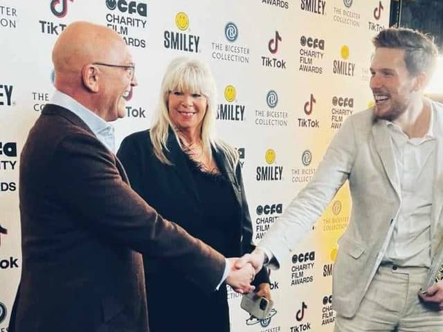 Jordan Hudson, whose film ‘Four Beats- Jordan’s Story’ won a gold award at the CFA Charity Film Awards, is congratulated by judge and celebrity chef Gregg Wallace, while Jordan's proud mum, Sonia looks on