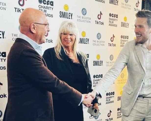 Jordan Hudson, whose film ‘Four Beats- Jordan’s Story’ won a gold award at the CFA Charity Film Awards, is congratulated by judge and celebrity chef Gregg Wallace, while Jordan's proud mum, Sonia looks on