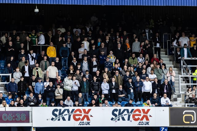 Preston North End supporters enjoying the match atmosphere.
