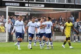 PNE players celebrate Jacob Slater's first goal, and PNE's second
