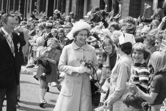 Eager faces lined up to meet the Queen during her Preston visit in 1977
