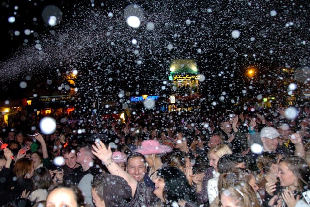 Delight etched on the faces in the crowd as snow fell on Preston's Flag Market as the Christmas lights were lit