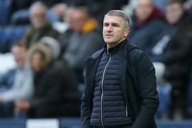 Preston North End manager Ryan Lowe watches the second half action from the technical area