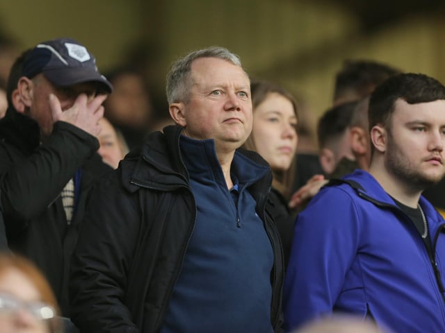 Preston North End fans anxiously watch the second half action