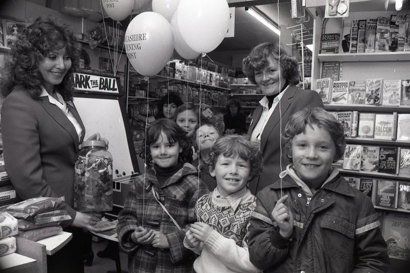 It's "Post" Party Time at Ivan Baldwin's newsagents shop in Meadow Street, Preston. Children visiting the shop have tried to guess the number of sweets in a jar and taken part in the ever popular Mark the Ball contest. Helping out here are Irene Holdon from the "Post" newspaper sales department, and area sales supervisor Kay Tomlinson