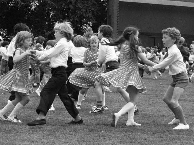 Over 1,000 schoolchildren crowded on to Preston's Avenham Park for an afternoon of singing and dancing. The children came from 28 primary school in Preston, Leyland and district to take part in Preston's 42 annual Children's Festival of English Folk Dancing. Pictured: Boys and girls of St Gerard's Junior School, Lostock Hall, dancing in the festival