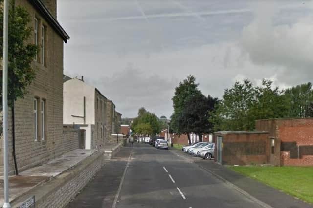 Two men were attacked and robbed by four men carrying weapons in Birtwistle Street, Accrington (Credit: Google)