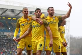 Preston North End's Ched Evans celebrates scoring his side's third goal against Blackburn Rovers