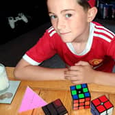 Frankie-Rae Winter (seven ) is a Rubik's Cube master after solving four in less than six minutes