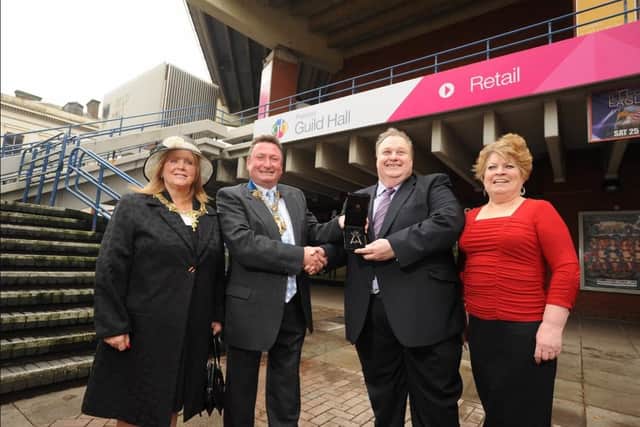 Simon Rigby receives the keys to the Guild Hall after buying it for £1 in 2014.