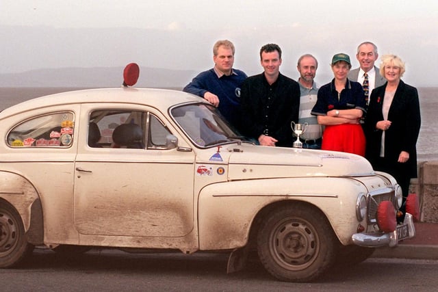 Morecambe Illuminations Rally 1999... Winners of the Morecambe Tourism Trophy for the mixed crew award was presented by councillors June Ashworth and Paul Morris to Jayne Wignall and Fred Bent who competed in their Volvo PV544. Also pictured are Nick Payne from sponsors Pye Motors and clerk of the course Derek Shepherd