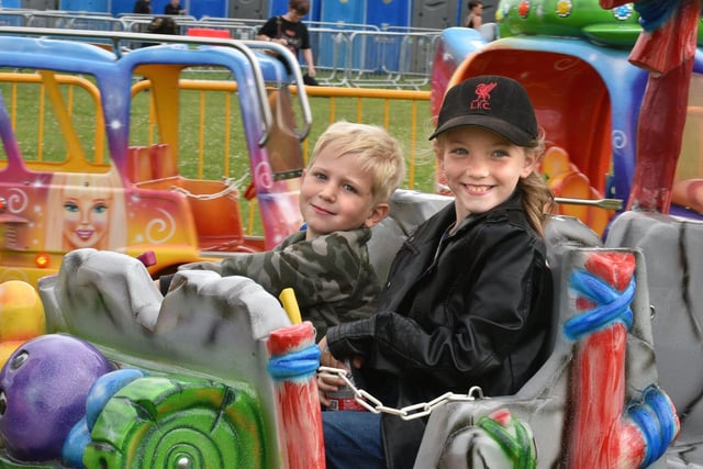 Amelia and Lincoln Hindley enjoy the fairground at Rock Prest, Moor Park, Preston.