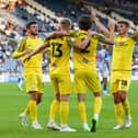 PNE players celebrate one of Ali McCann's goals.