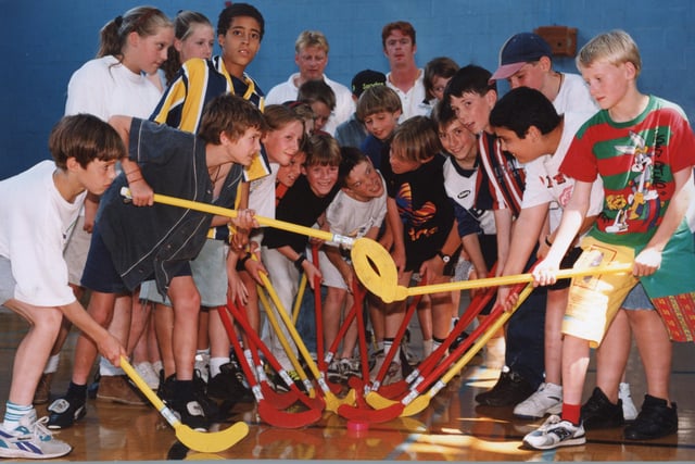 Teams battle it out at the 11-13s hockey match at Fulwood Leisure Centre during the 1998 summer holidays activities