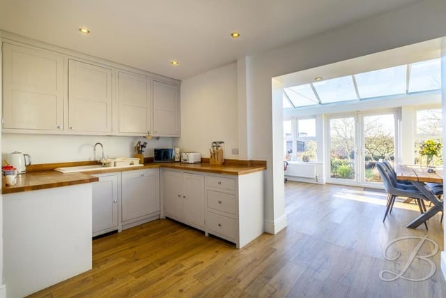 Estate agents BuckleyBrown describe the High Oakham Hill property's kitchen as "stunning and attractive". It comes complete with a range of stylish units and cabinets, and opens nicely into the conservatory.