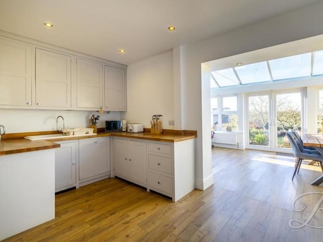 Estate agents BuckleyBrown describe the High Oakham Hill property's kitchen as "stunning and attractive". It comes complete with a range of stylish units and cabinets, and opens nicely into the conservatory.