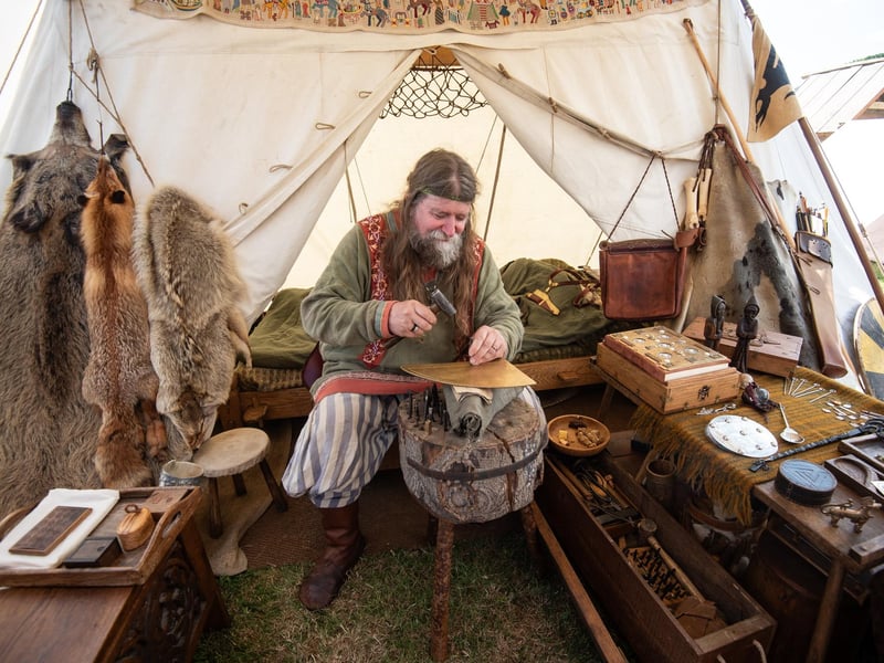 Heysham Viking Festival 2026 - a Viking doing traditional crafts.