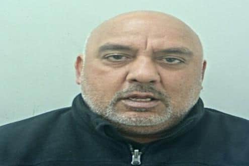 Amir Afzal, 59, was stopped twice by police - and both times he was found to have cannabis and cash in his vehicle (Credit: Lancashire Police)