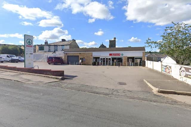 Two balaclava-clad men armed with metal bars stole cigarettes and alcohol from a SPAR store in Burnley. (Credit: Google)