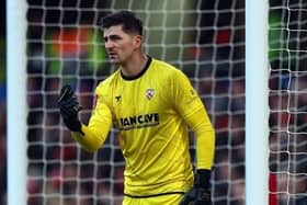 Morecambe keeper Harry Burgoyne was in the thick of the action (Photo: Bryn Lennon/Getty Images)