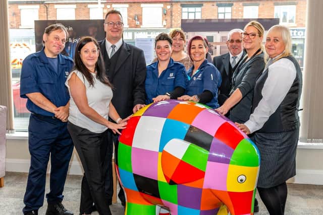 The Co-op Funeralcare Bispham team with Elmer 