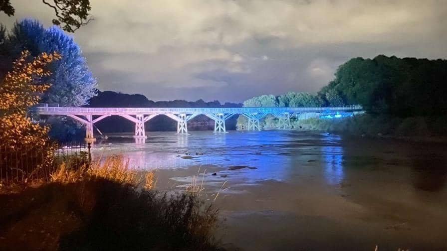 The Old Tram Bridge during a multi-coloured makeover in September 2021 when a light show was used to highlight growing calls to reinstate the 220-year-old crossing point (image:  CDS events)