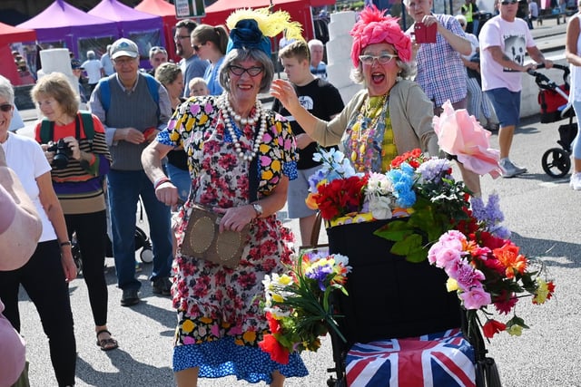 Having fun at the vintage festival in vintage clothing.