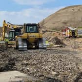 The Clayton Hall landfill site, pictured during damping down after a fire in 2021