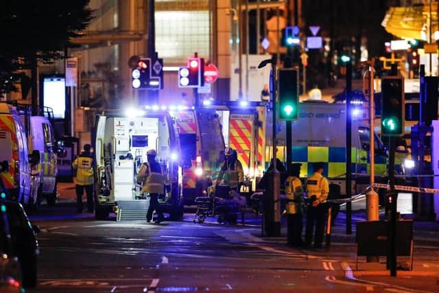 Emergency services working at the scene of the Manchester Arena Bombing. Picture: SWNS