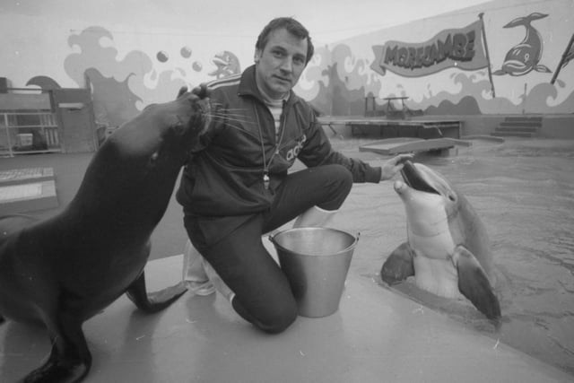 Lancaster city councillors met to discuss their next step in the call to take away the zoo licence of Morecambe's controversial Marineland. They were under pressure to ban animal performances at the venue. Pictured is John Braithwaite, with Sally the seal and Rocky the dolphin