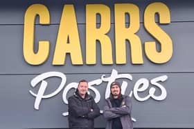 FASTSIGNS' Aaron Woodward alongside James Carson of Carrs Pasties. Photo: Tank PR
