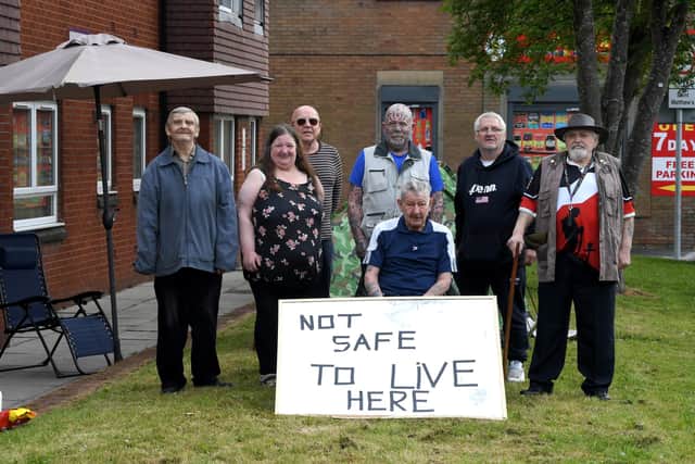 Residents of New Brook House in Preston staging a protest against the management company