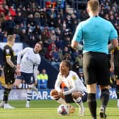 Preston North End's Daniel Johnson composes himself ahead of sending Wigan Athletic's Ben Amos the wrong way to score the equalising goal from the penalty spot to make the score 1-1