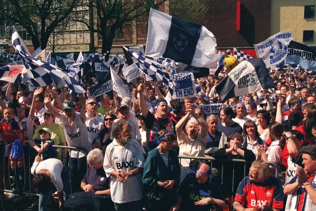 Preston North End fans celebrate winning the league back in the year 200 with a procession on the Flag Market in Preston