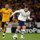 Ben Woodburn in action alongside Joao Moutinho at Molineux.