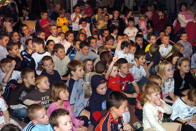 Young North Enders wait to meet the players during the Christmas party in the Great Room, Deepdale in 2004