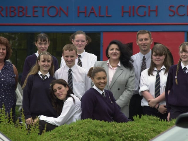 Fifteen-year-old Renata Giaaquitto from Naples, front left, who is shadowing Kira Walsh, front right, with Ribbleton Hall High School's Italian Club members. Also pictured (from left): Patricia Fogg, Sam Rudd, Susanna Furesz, Kevin Atkinson, Kerry Lang, Marian Zambon, Natalie Cross, Gerald Hornby, and Alisa Vickers. This image was taken in the year 2000