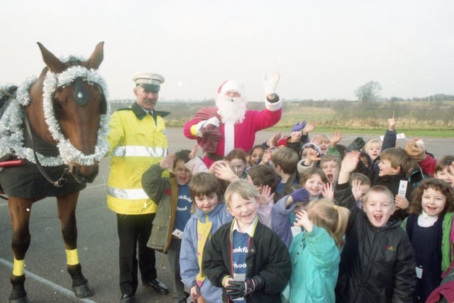 Santa was making his rounds in Chorley with police horse Viscount - much to the delight of these excited children