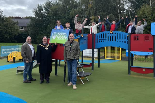 Children from St Mary’s and St Benedict’s, St Aidan’s CE Primary School, the Mayor and Leader of the Council officially open Holme Playing Field Playground.